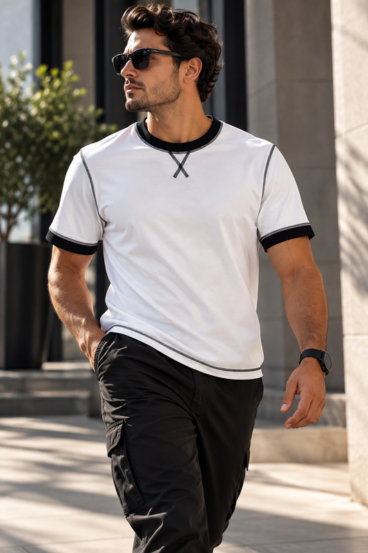 Model wearing the DREVYNOR contrast stitch oversized T-shirt